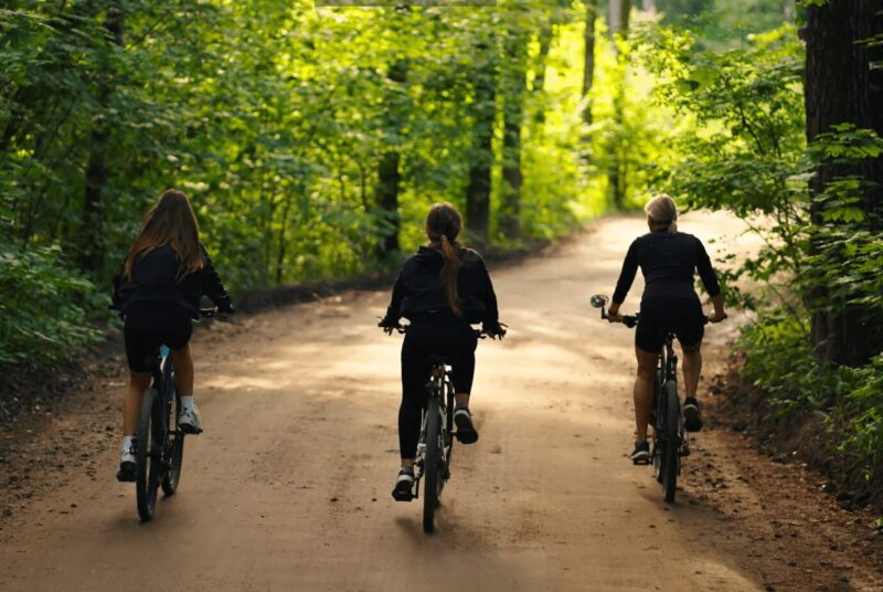 group of bikers riding through Green Lake trail in Seattle