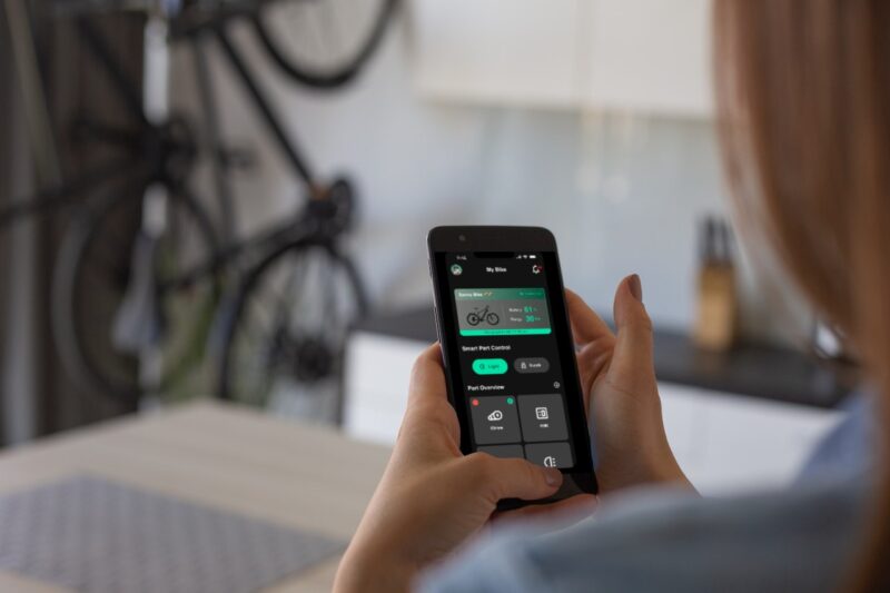 Woman looking at her bike app