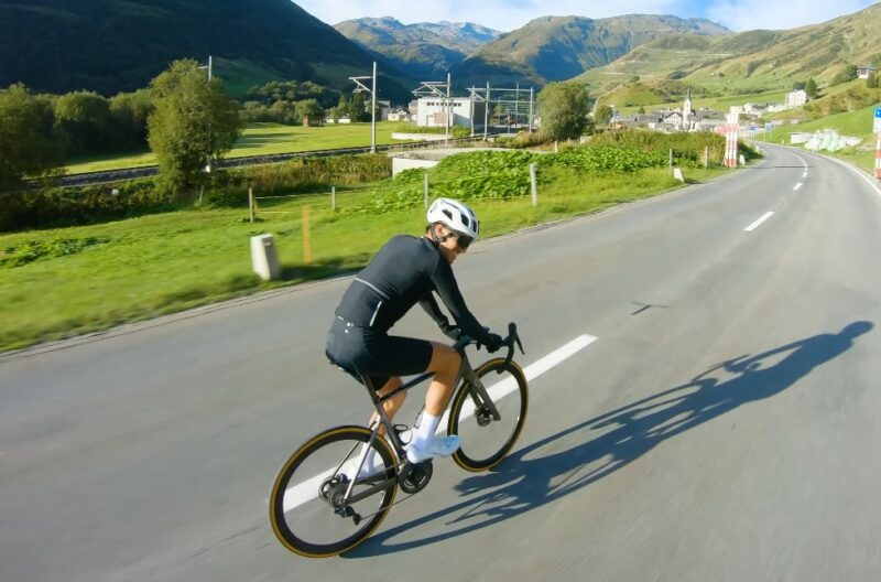 Man rides road bike on the road