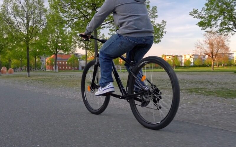 A person riding a bicycle outdoors