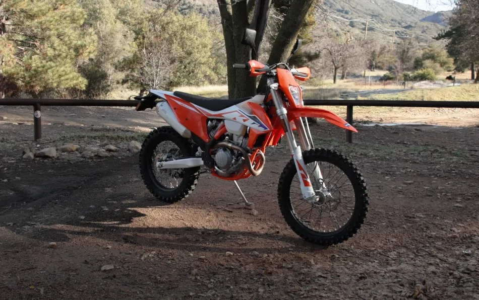 Orange KTM 350 EXC dirt bike parked