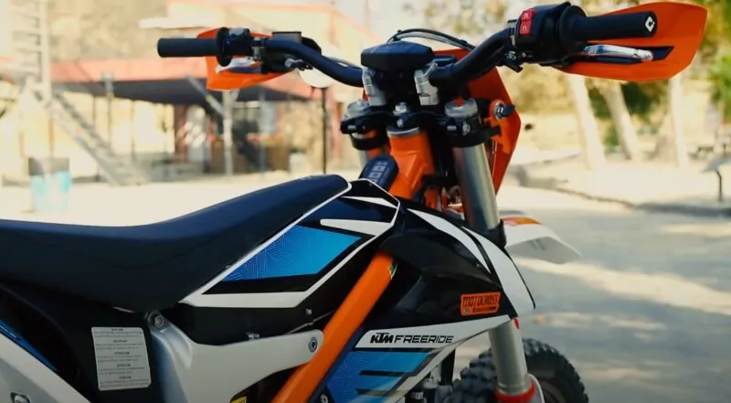 A close up photo of an electric dirt bike