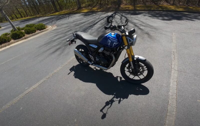 Blue 400cc bike standing on the road