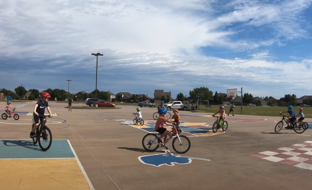 Kids riding bikes in bike park