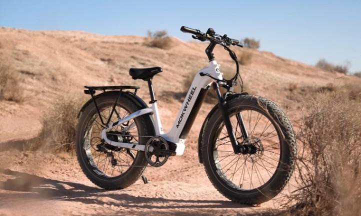 An electric bike parked on a dirt road